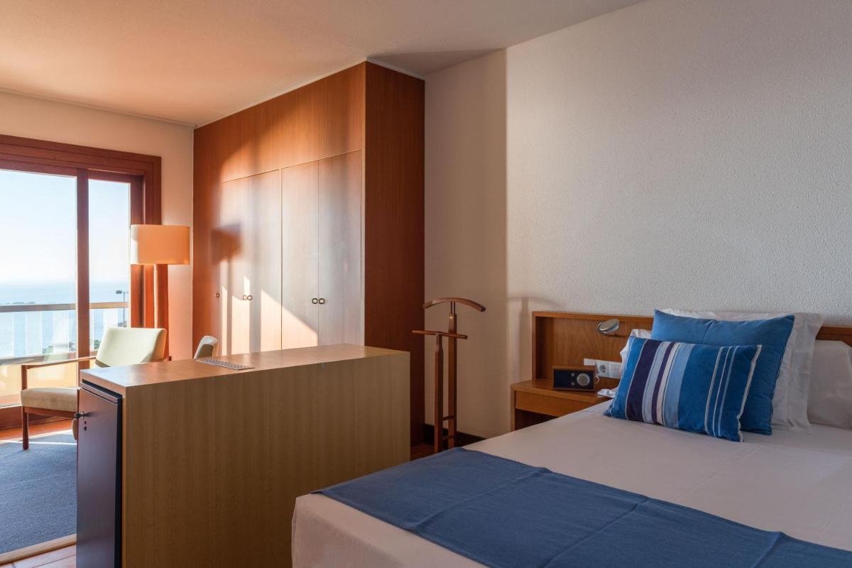 Cama o camas de una habitación en Almadraba Park Hotel