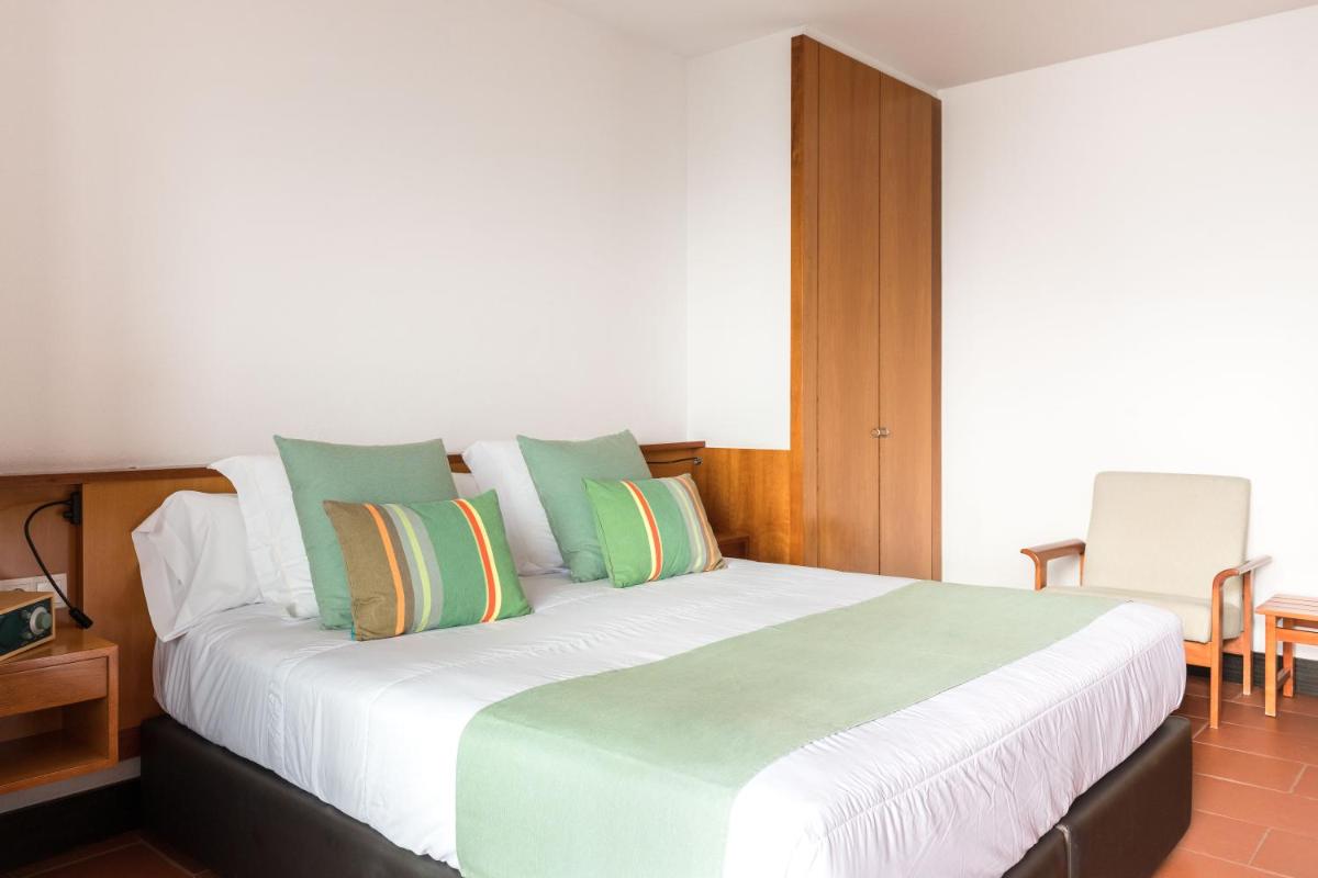 Cama o camas de una habitación en Almadraba Park Hotel