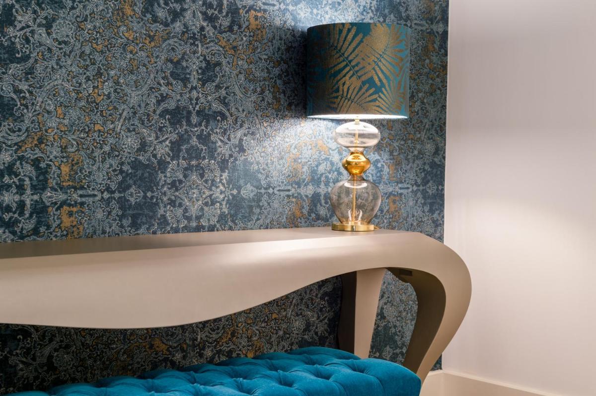 Coin salon dans l'établissement Hôtel Ginkgo - SPA Biloba