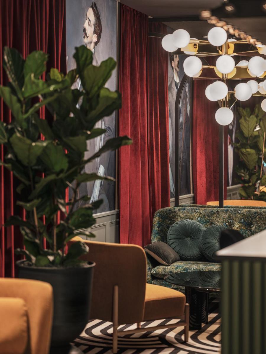Coin salon dans l'établissement Dandy Hotel
