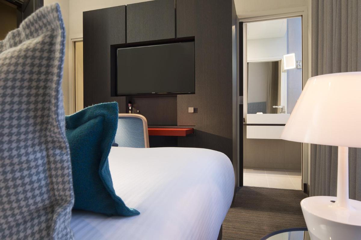 Cuisine ou kitchenette dans l'établissement Hotel D - Strasbourg