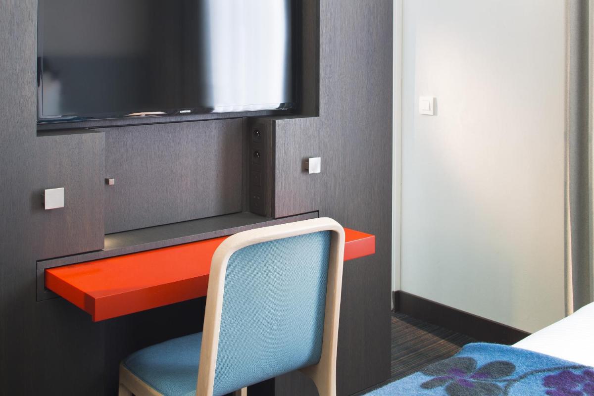 Un ou plusieurs lits dans un hébergement de l'établissement Hotel D - Strasbourg