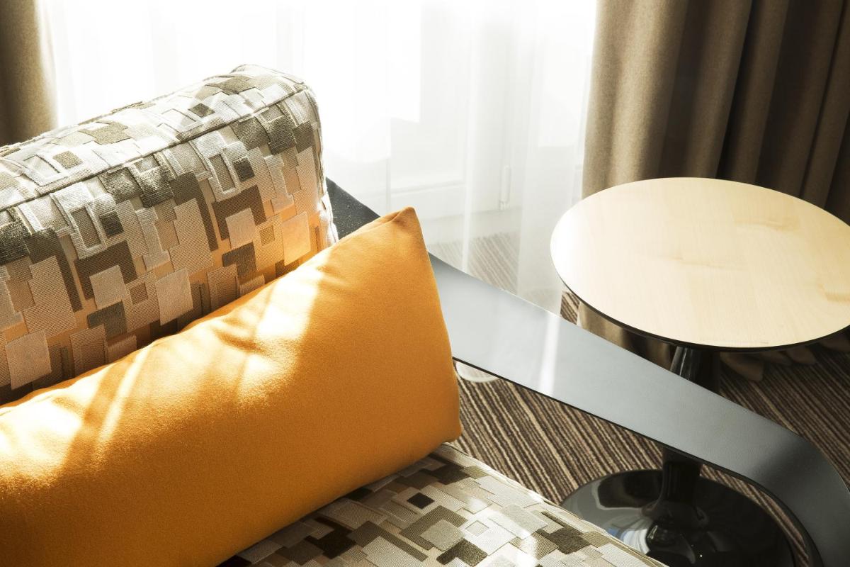 Coin salon dans l'établissement Hotel D - Strasbourg