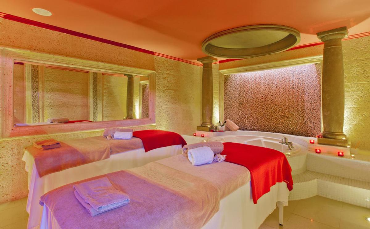 Cama o camas de una habitación en Lago Garden Apart-Suites & Spa Hotel