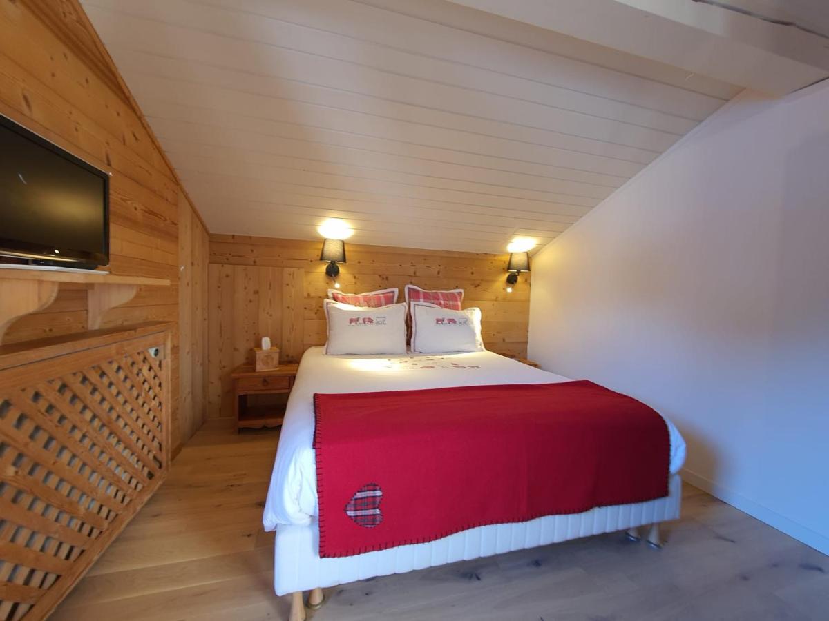 Un ou plusieurs lits dans un hébergement de l'établissement Café-Hôtel Le Morillon, Domaine du Grand Massif-Samoëns