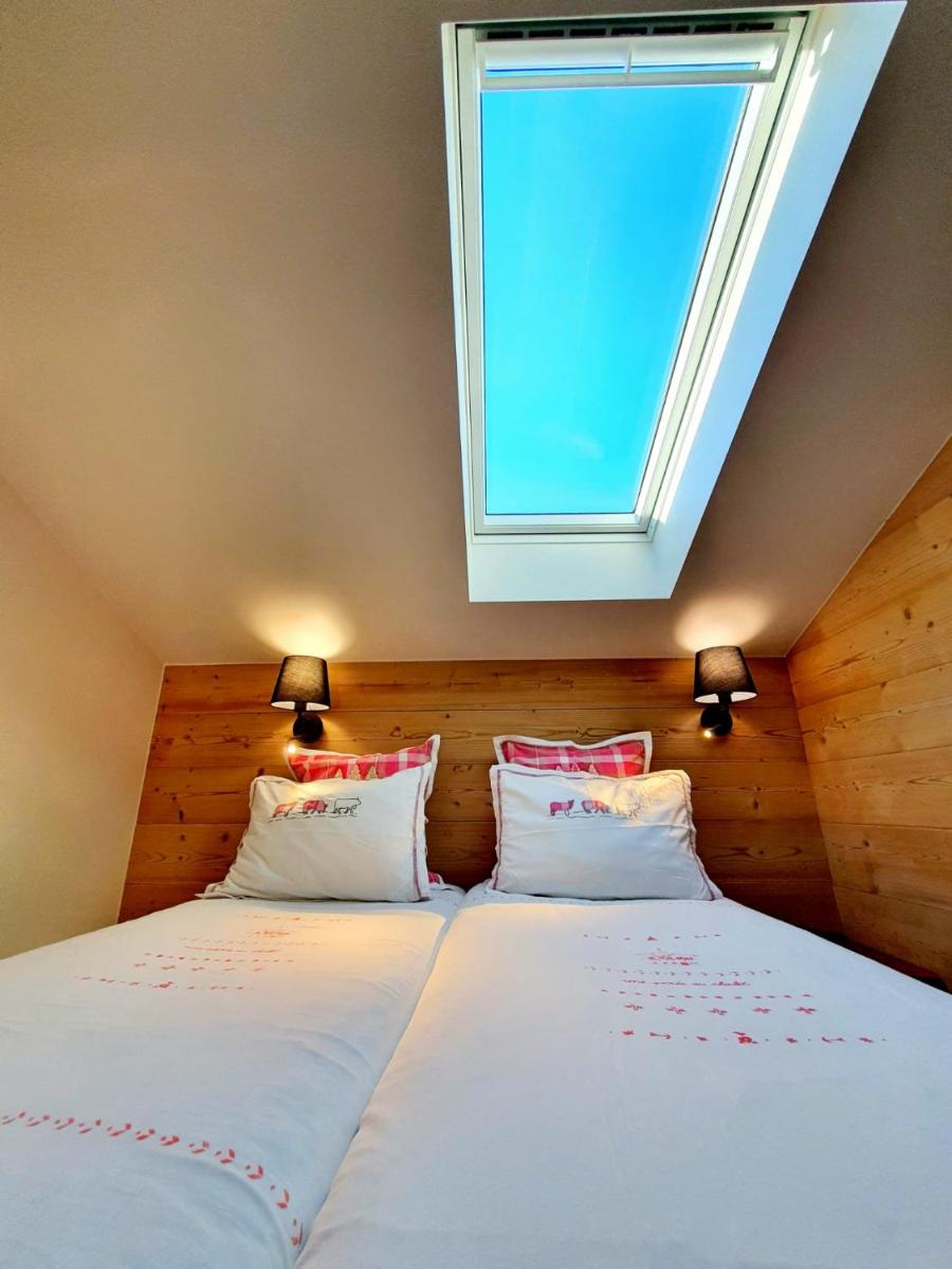Un ou plusieurs lits dans un hébergement de l'établissement Café-Hôtel Le Morillon, Domaine du Grand Massif-Samoëns