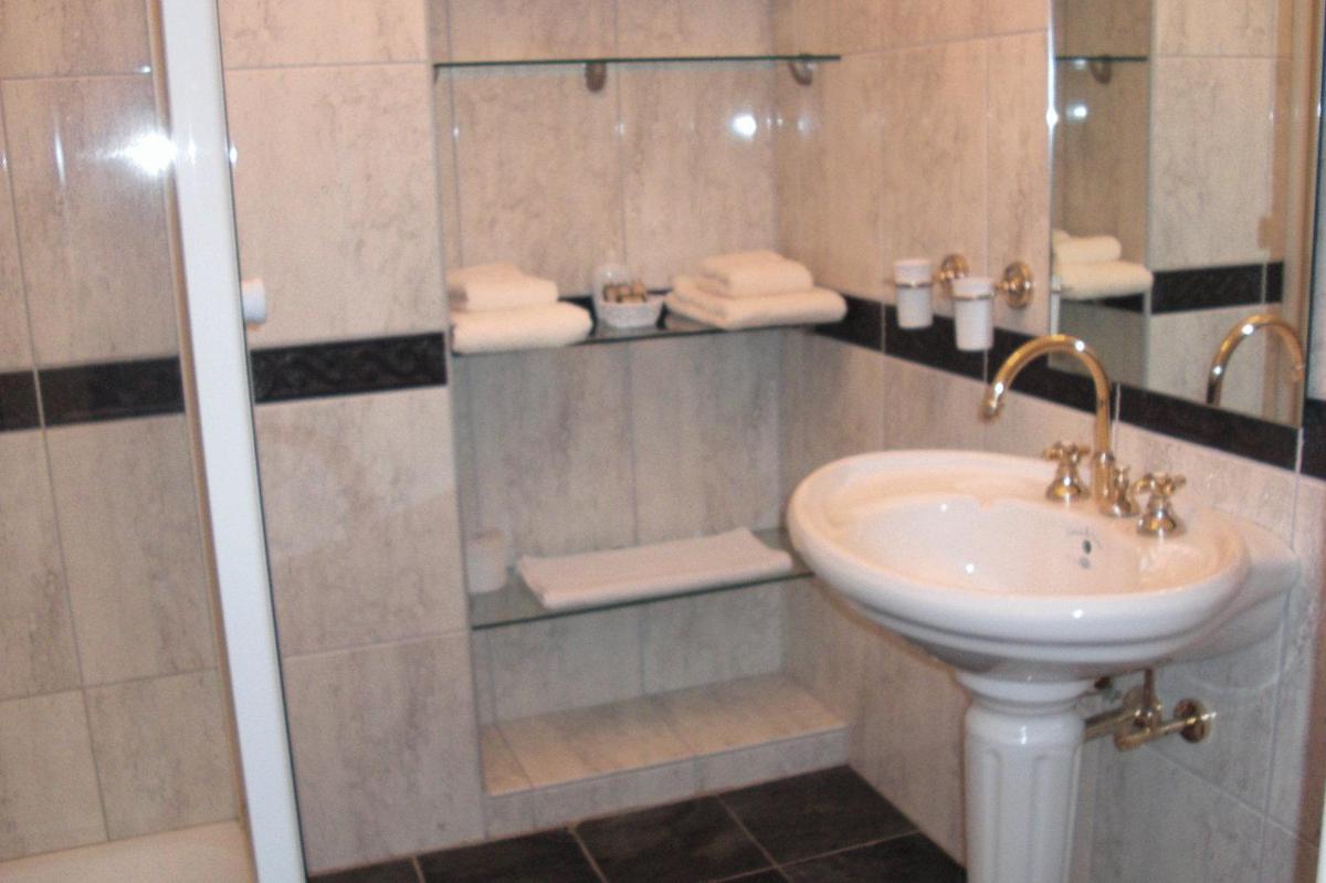 Ein Badezimmer in der Unterkunft Herrenhaus Borghorst