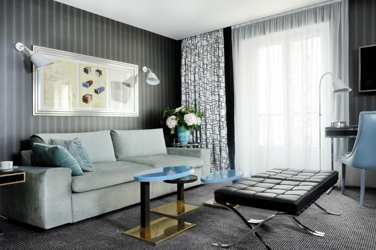 Coin salon dans l'établissement Hôtel Baume