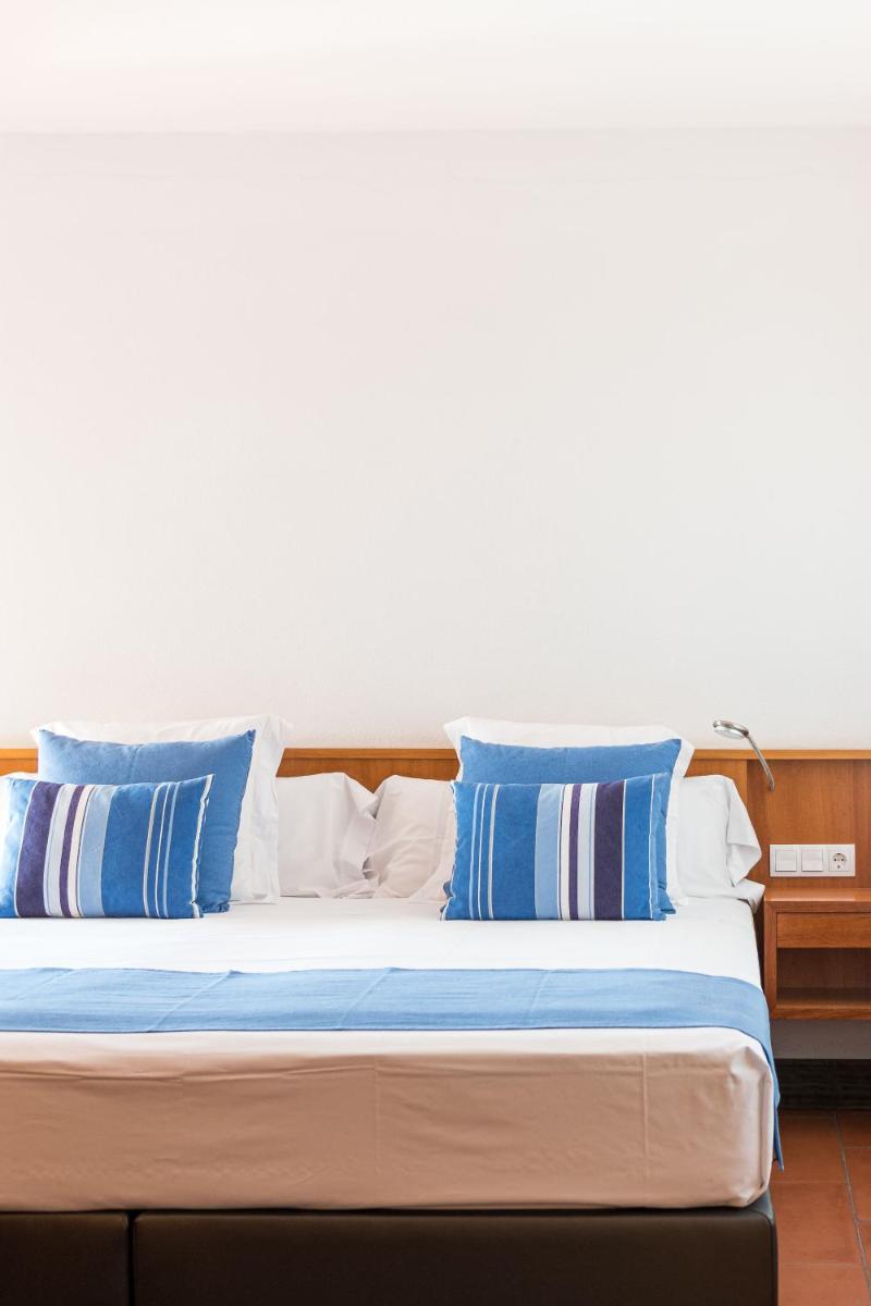 Cama o camas de una habitación en Almadraba Park Hotel