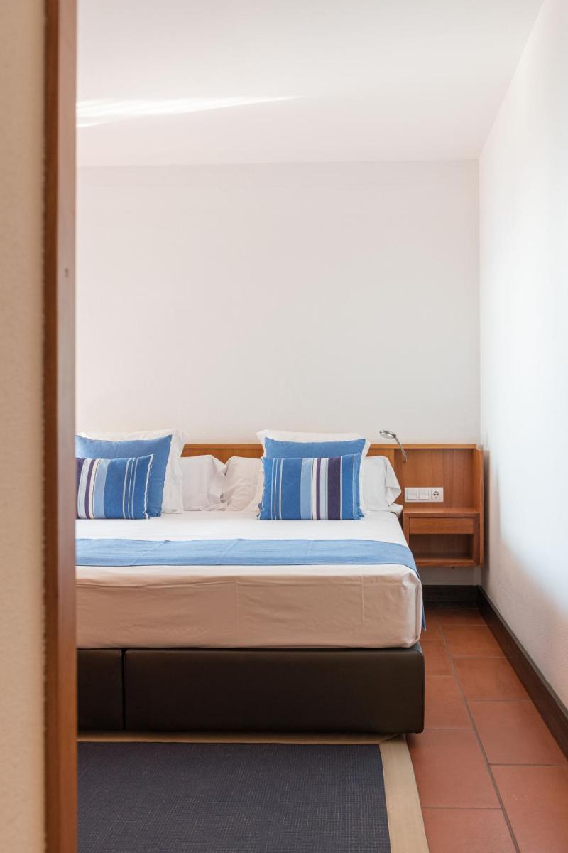 Cama o camas de una habitación en Almadraba Park Hotel