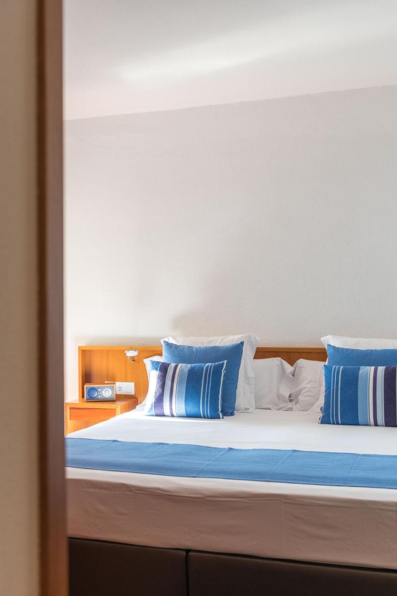 Cama o camas de una habitación en Almadraba Park Hotel