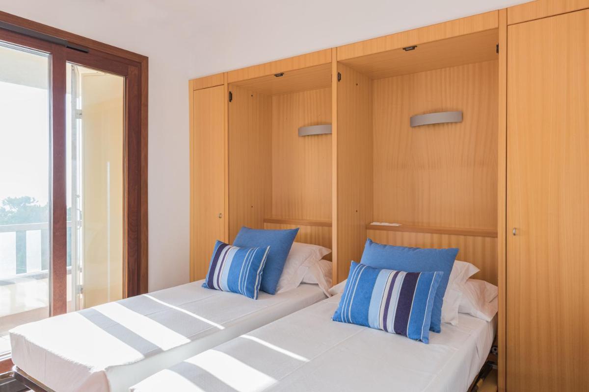 Cama o camas de una habitación en Almadraba Park Hotel