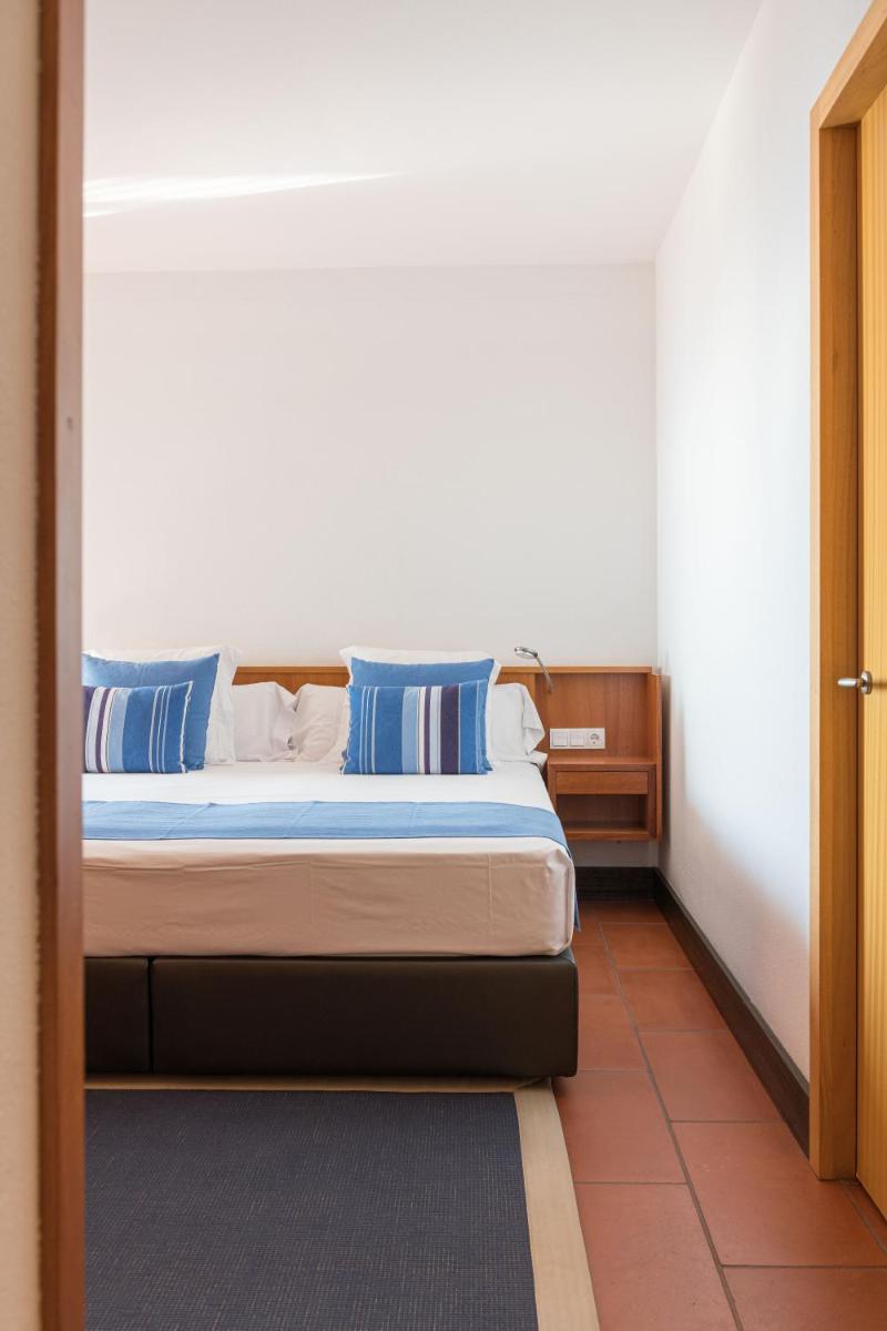 Cama o camas de una habitación en Almadraba Park Hotel