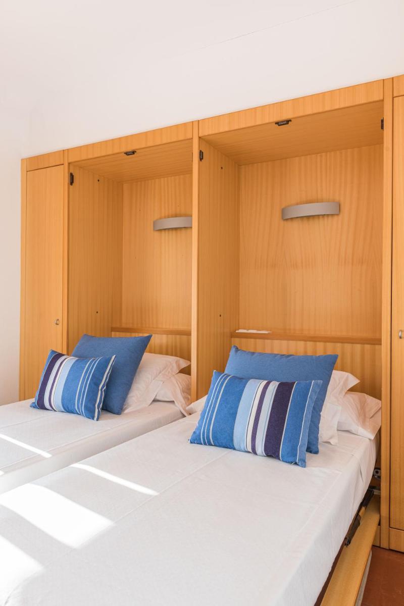 Cama o camas de una habitación en Almadraba Park Hotel