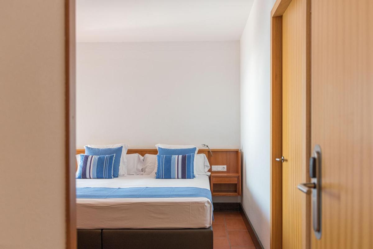 Cama o camas de una habitación en Almadraba Park Hotel