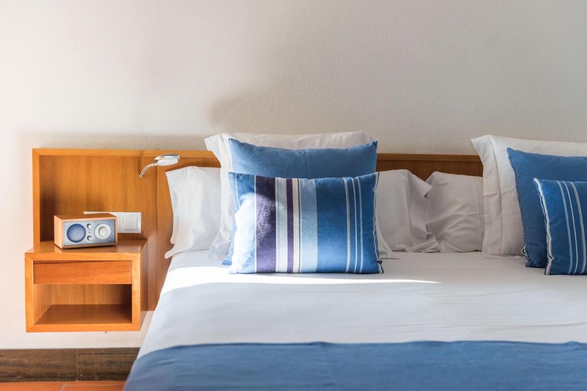 Cama o camas de una habitación en Almadraba Park Hotel