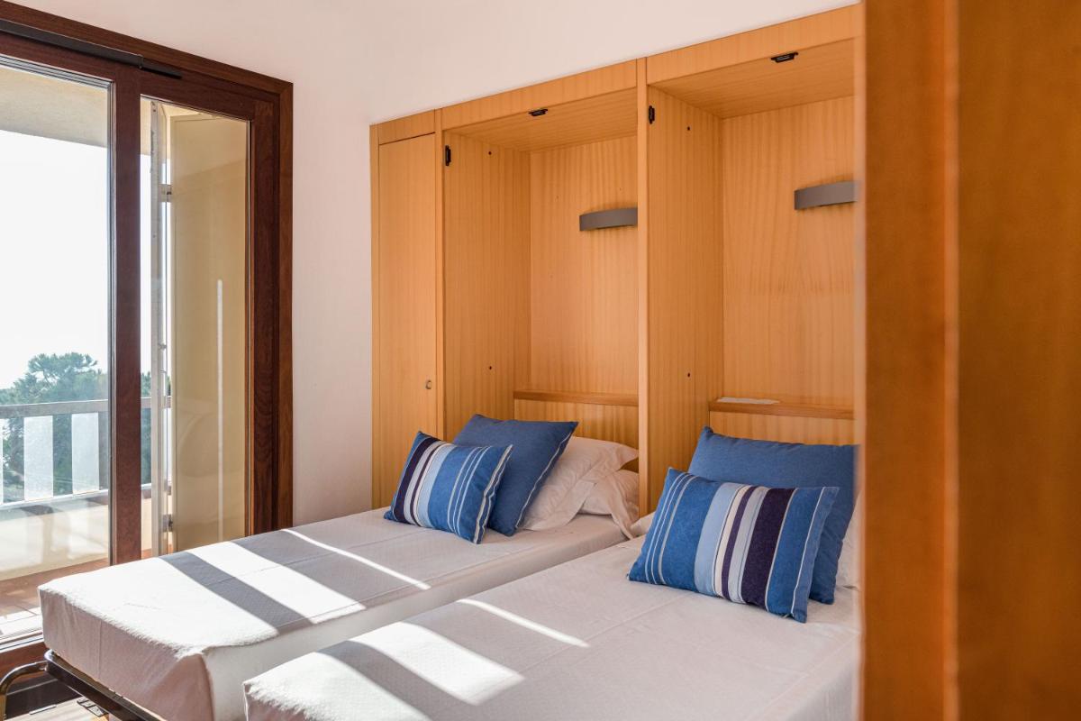 Cama o camas de una habitación en Almadraba Park Hotel