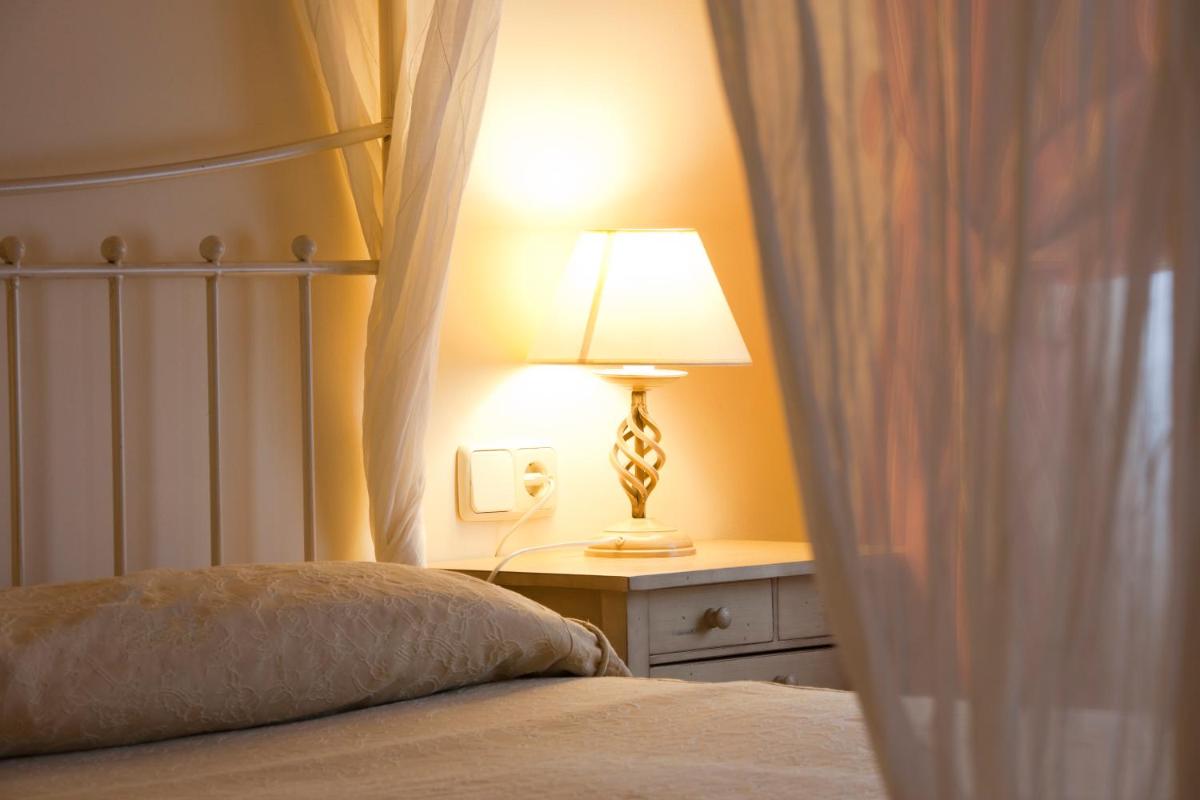 Cama o camas de una habitación en Hotel Silken Villa de Laguardia