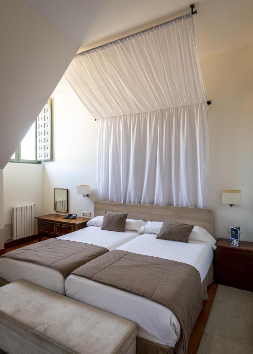 Cama o camas de una habitación en Parador de La Granja