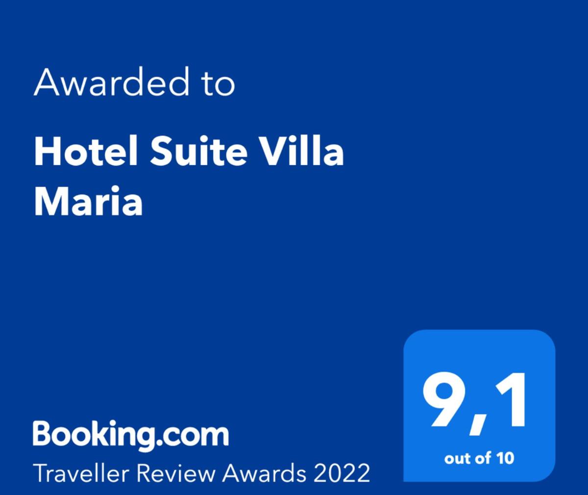 Certificado, premio, señal o documento que está expuesto en Hotel Suite Villa Maria