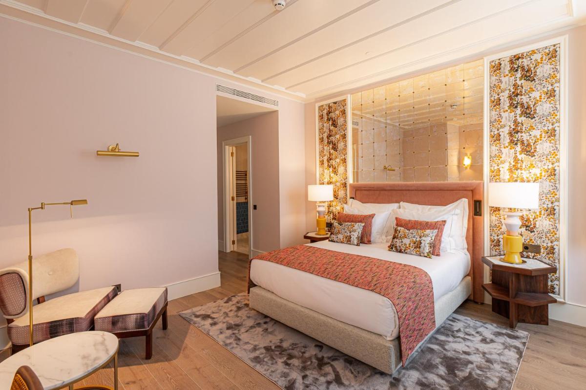 Uma cama ou camas num quarto em Palácio Ludovice Wine Experience Hotel