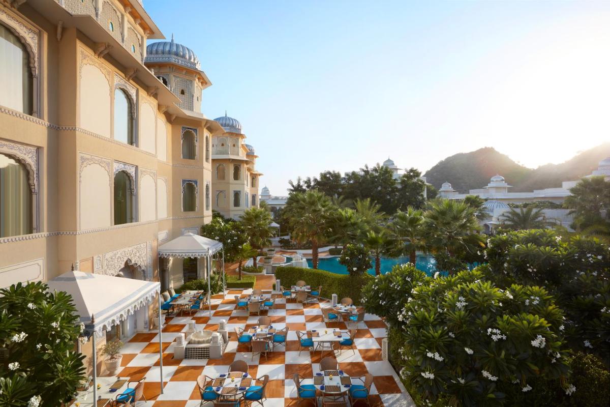 an aerial view of a resort with a pool at The Leela Palace Jaipur in Jaipur