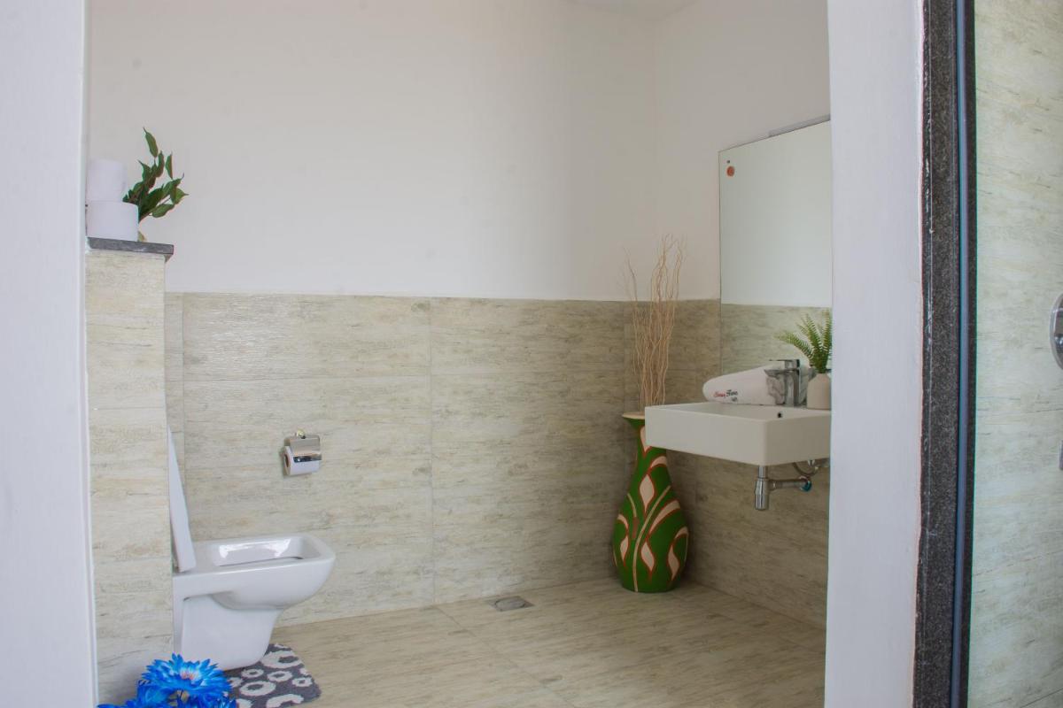 Suitetrails - Imagine by Benaa , ELEGANT 1BR IN KILIMANI STRONG WIFI With pool