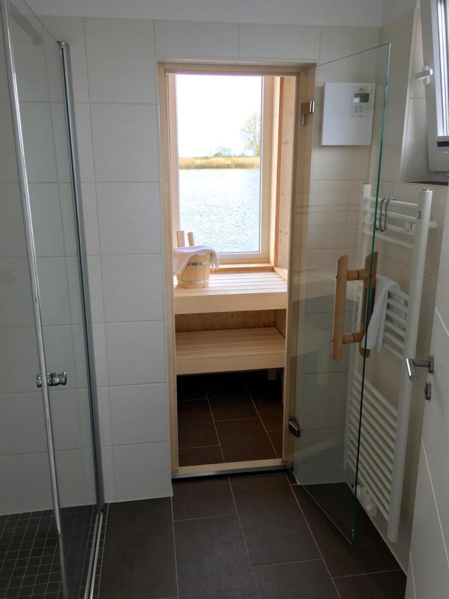 Ein Bett oder Betten in einem Zimmer der Unterkunft Schwimmende Häuser im BALTIC SEA RESORT