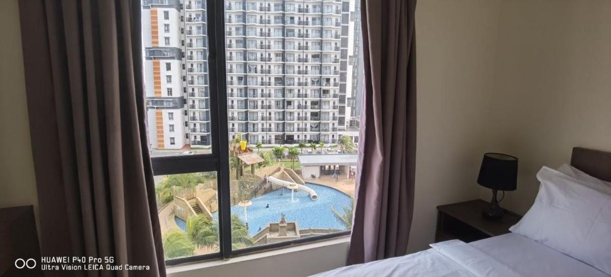 Pool view + water theme park @swiss garden residence - Hizvo