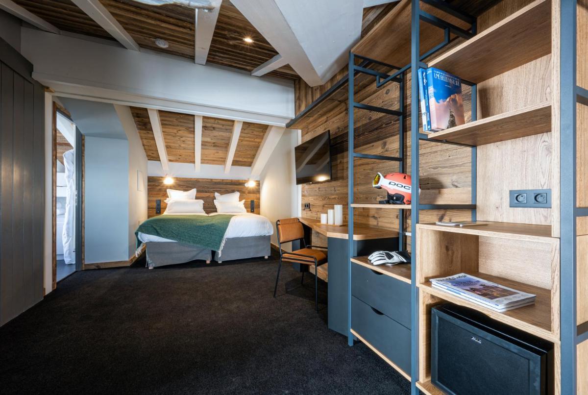 Un ou plusieurs lits dans un hébergement de l'établissement Hôtel Le Levanna by Les Etincelles