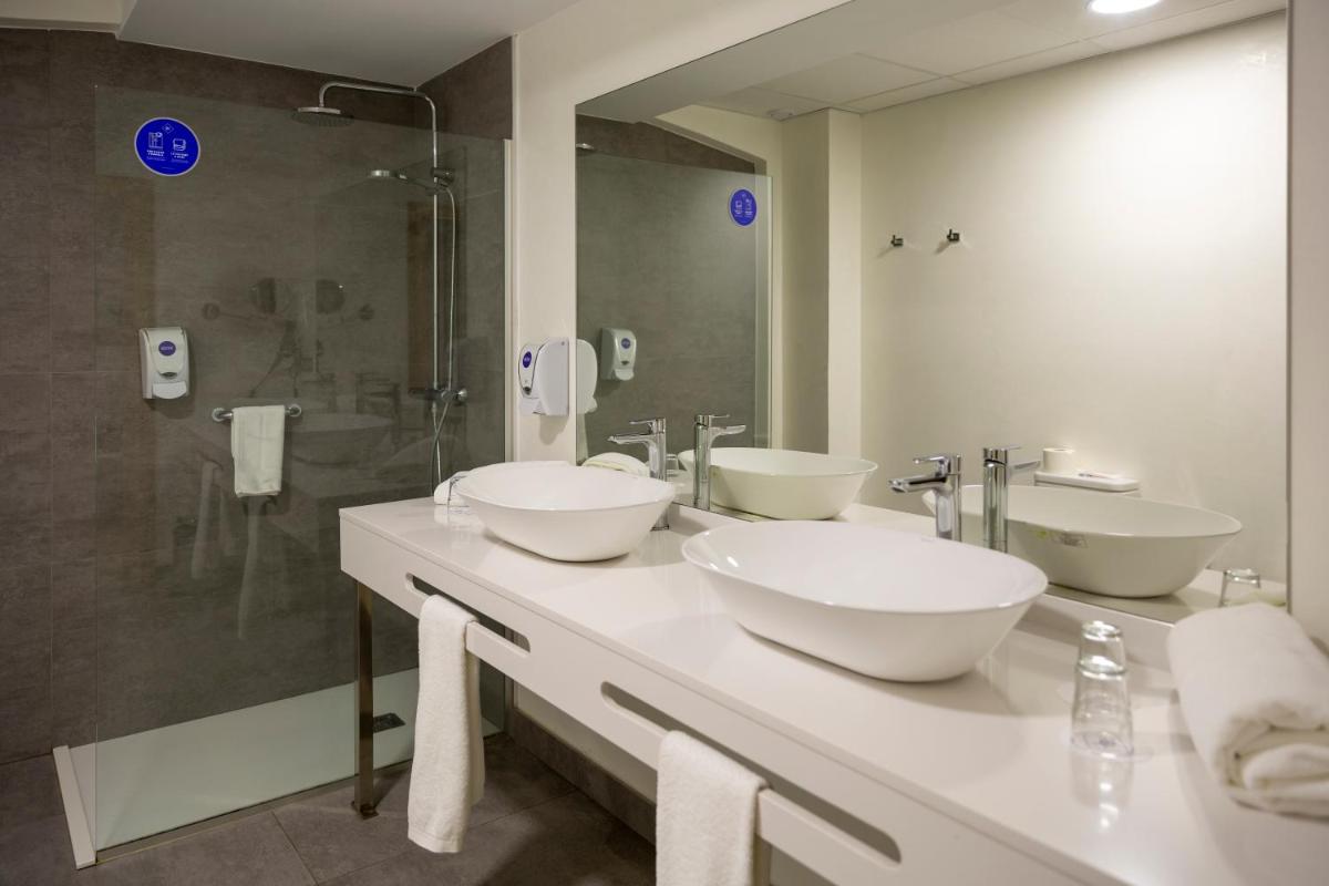 Un baño de IBERIK Augas Santas Balneario & Golf