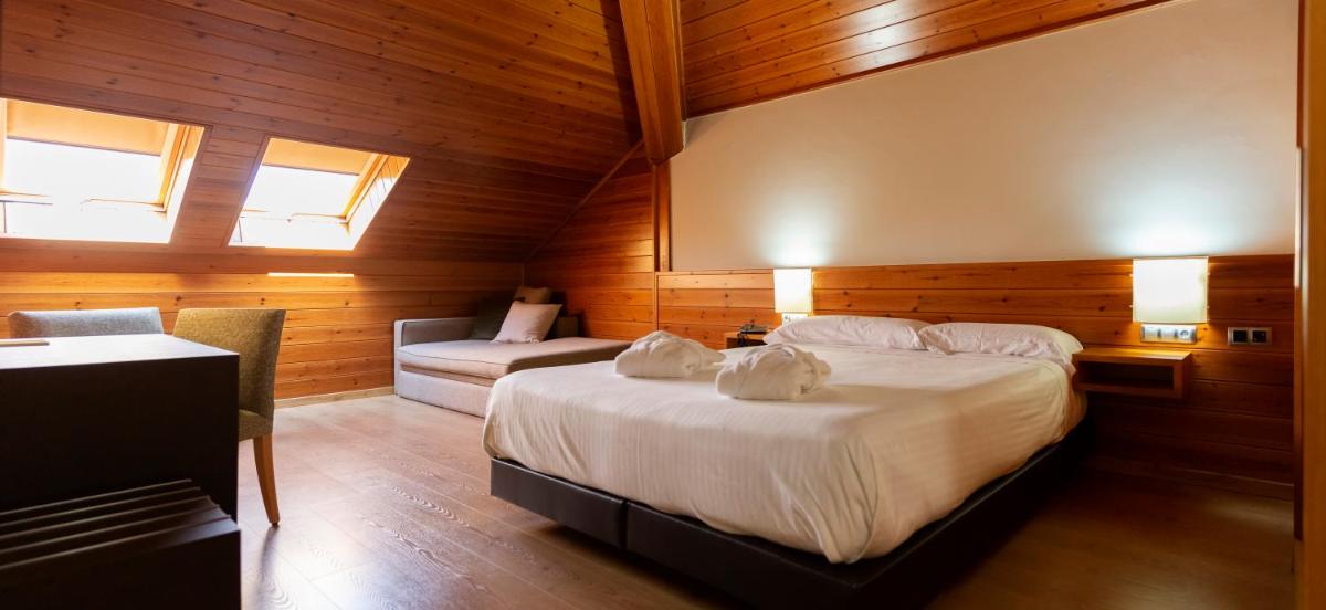 Cama o camas de una habitación en IBERIK Augas Santas Balneario & Golf