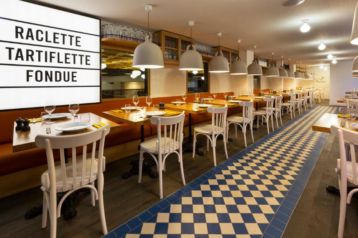 Restaurant ou autre lieu de restauration dans l'établissement RockyPop Flaine Hotel & Spa