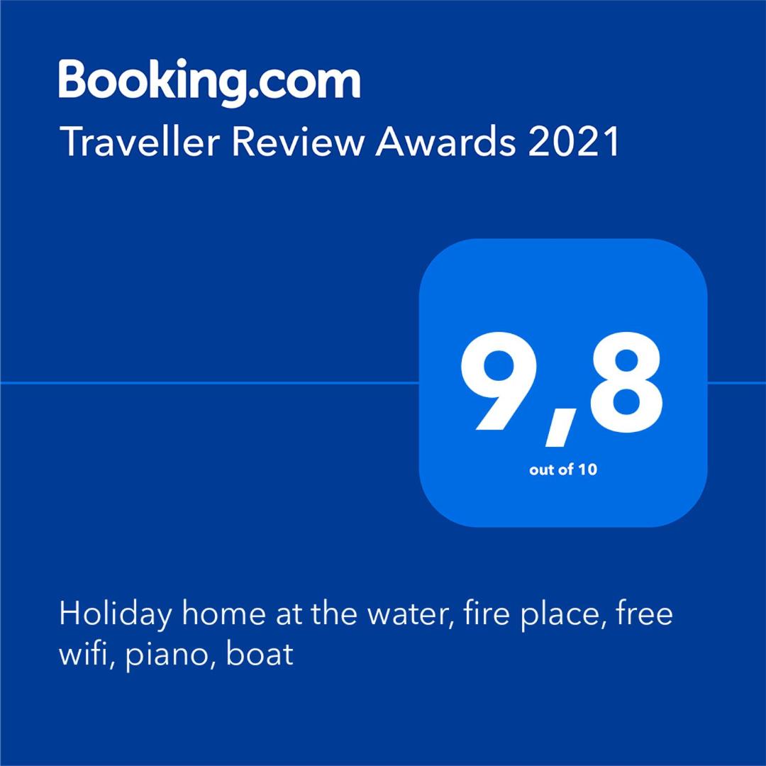 Holiday home at the water, fire place, boat and SUP rent, near Amsterdam - Housity