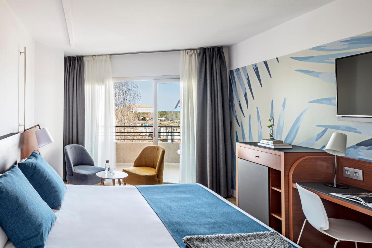 Cama o camas de una habitación en AQUA Hotel Onabrava & Spa 4*Sup