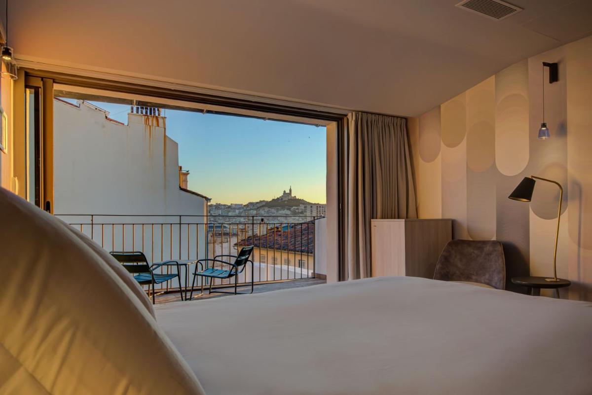 Un ou plusieurs lits dans un hébergement de l'établissement Alex Hotel & Spa