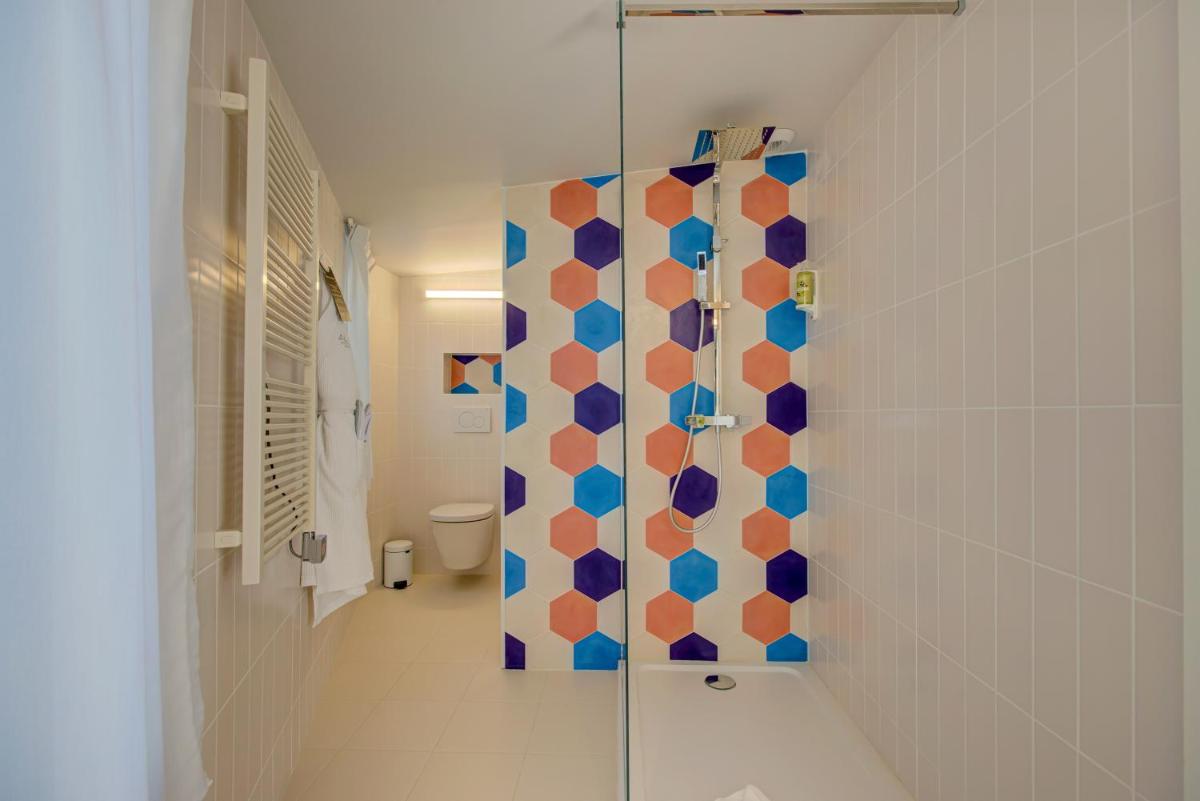 Salle de bains dans l'établissement Alex Hotel & Spa