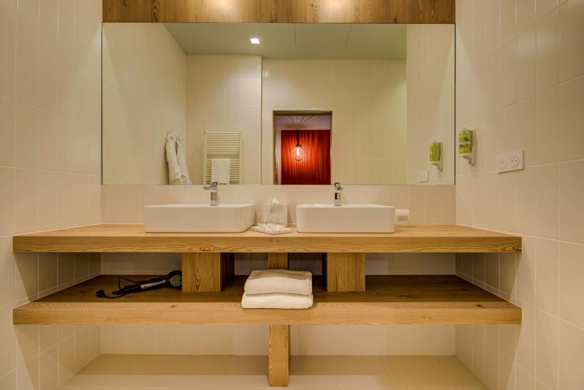 Salle de bains dans l'établissement Alex Hotel & Spa