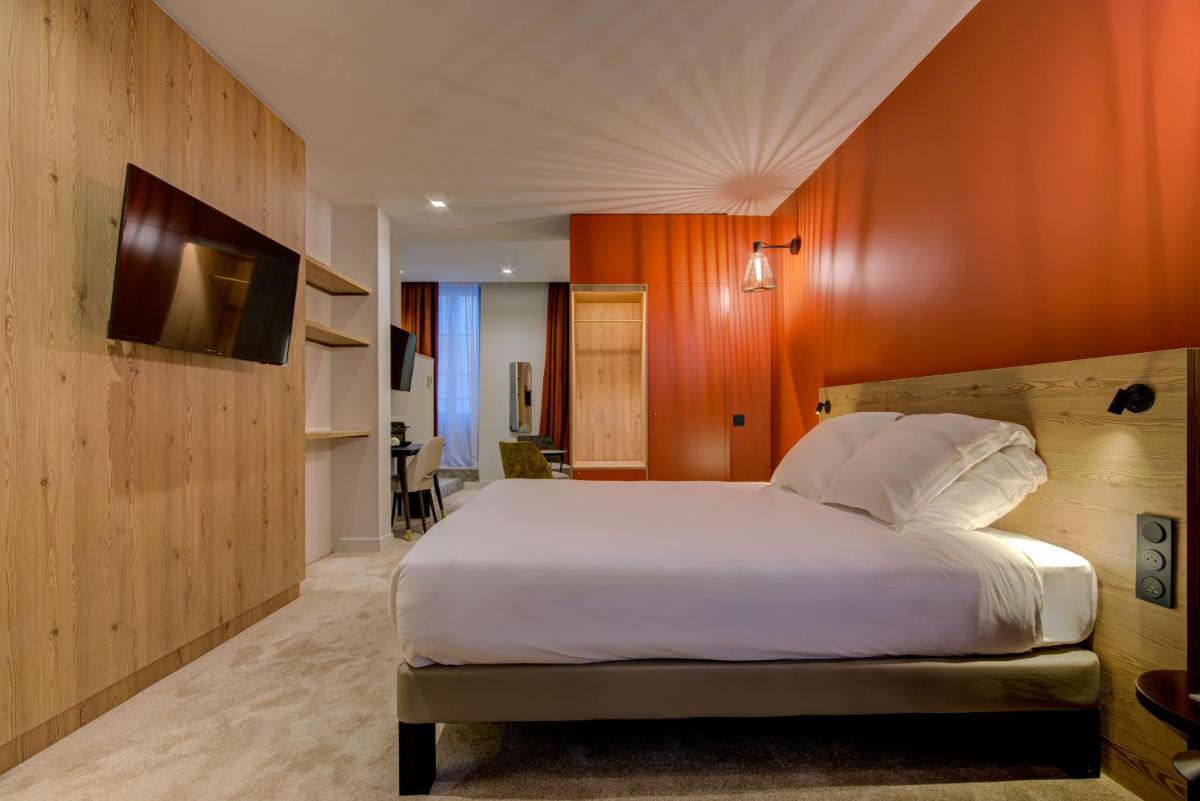 Un ou plusieurs lits dans un hébergement de l'établissement Alex Hotel & Spa
