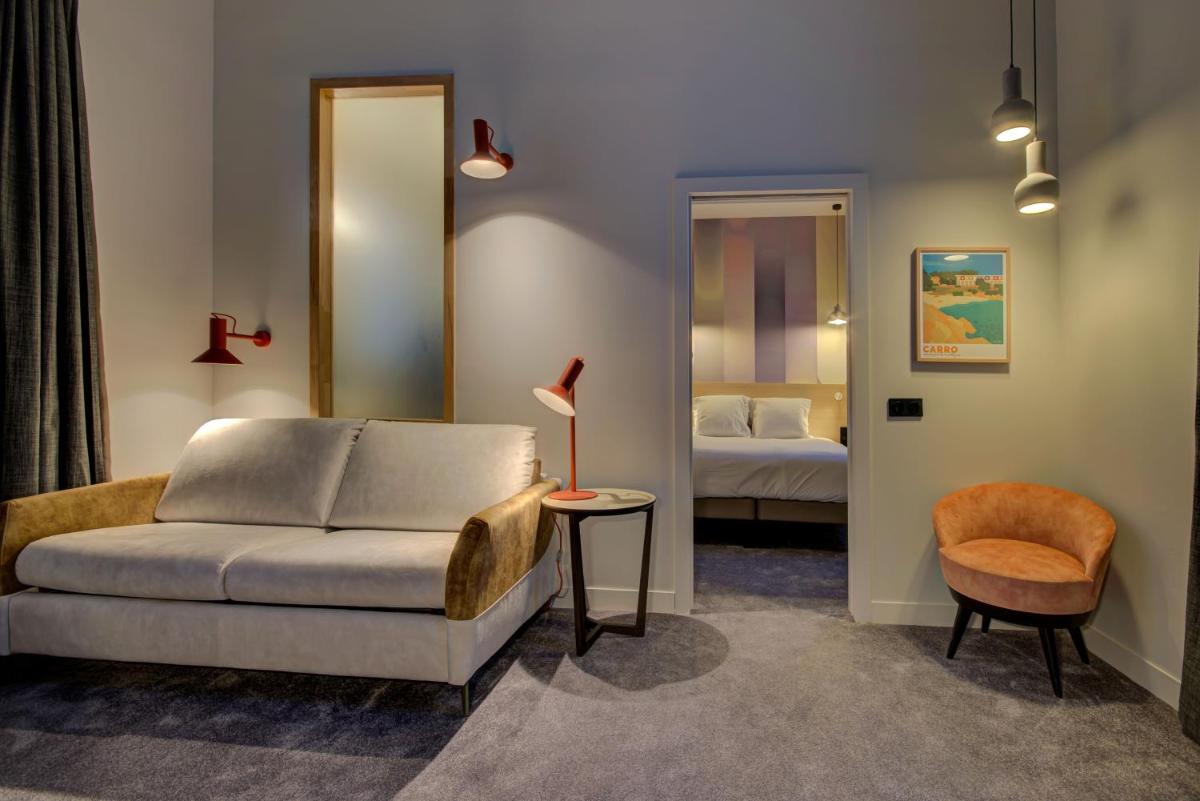 Un ou plusieurs lits dans un hébergement de l'établissement Alex Hotel & Spa