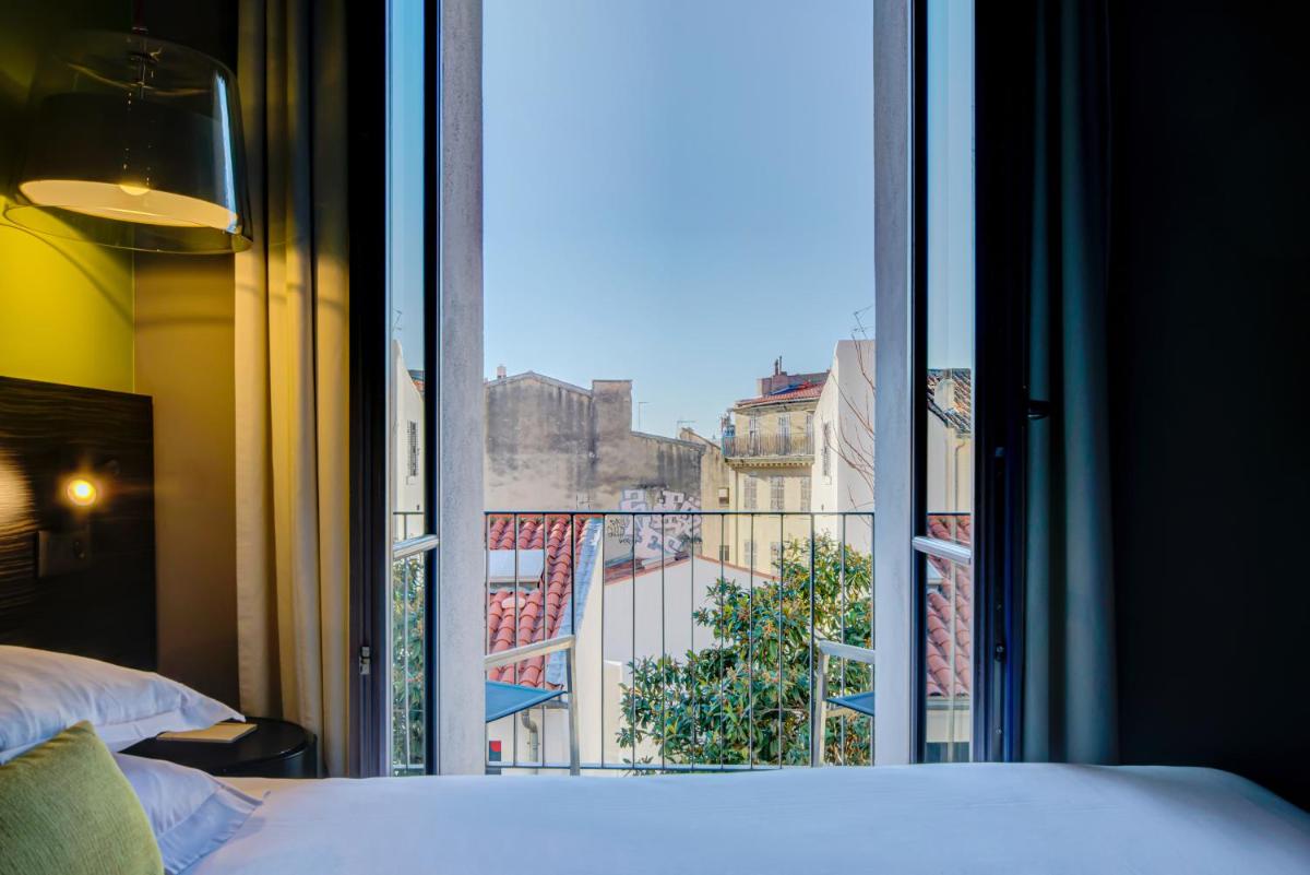 Un ou plusieurs lits dans un hébergement de l'établissement Alex Hotel & Spa