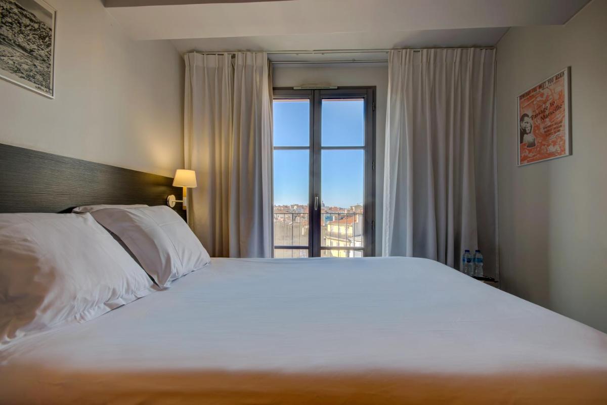 Un ou plusieurs lits dans un hébergement de l'établissement Alex Hotel & Spa
