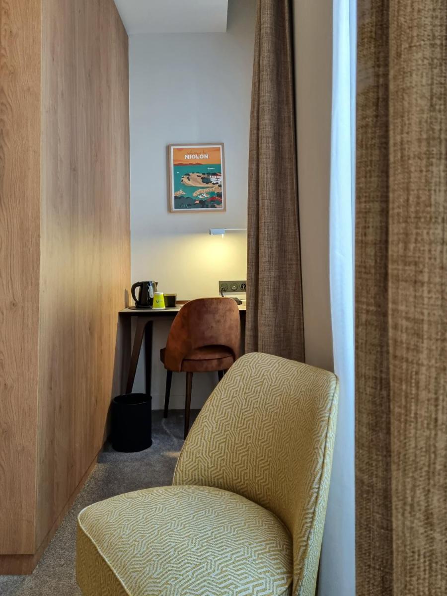 Coin salon dans l'établissement Alex Hotel & Spa