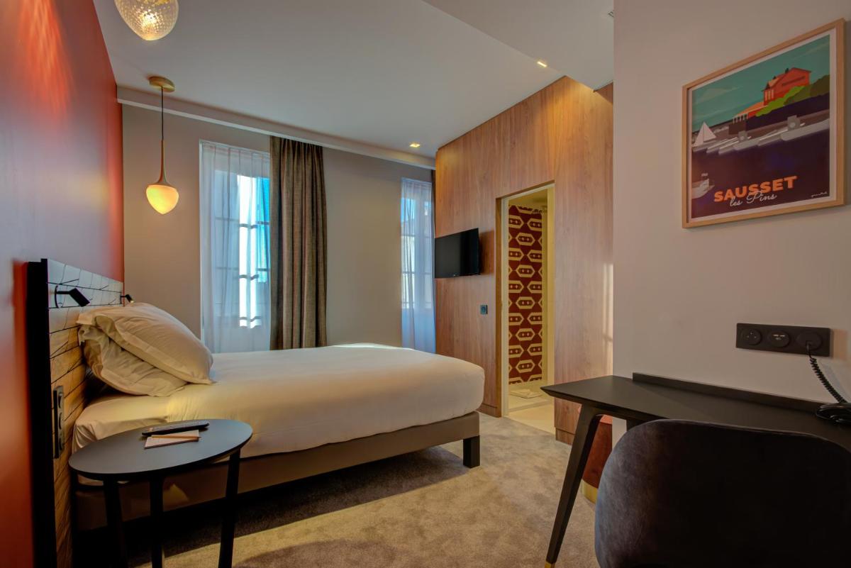 Télévision ou salle de divertissement dans l'établissement Alex Hotel & Spa