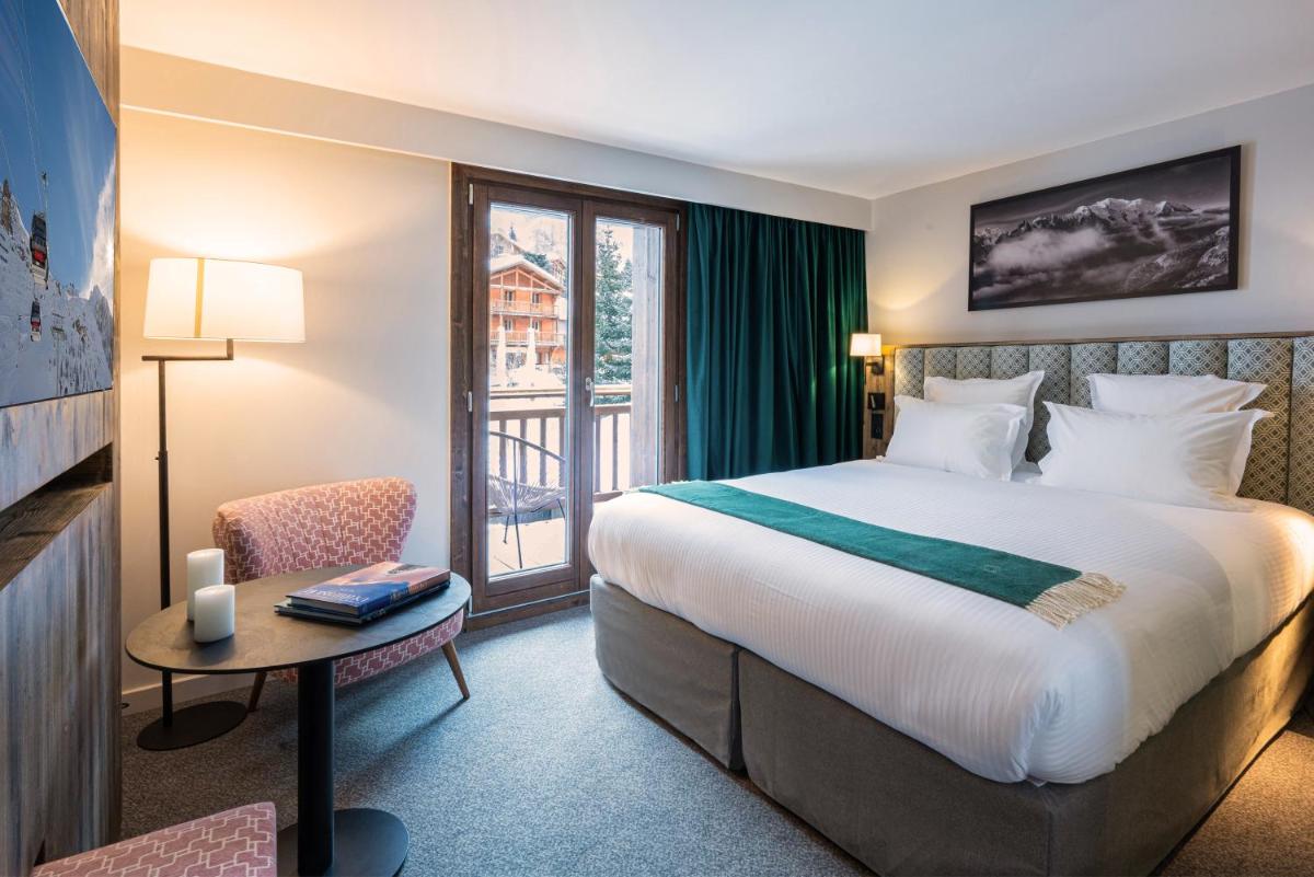 Un ou plusieurs lits dans un hébergement de l'établissement Hotel Tetras Lodge