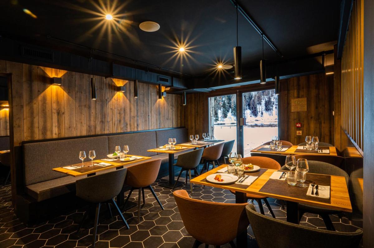 Restaurant ou autre lieu de restauration dans l'établissement Hotel Tetras Lodge