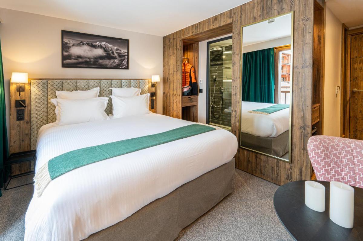 Un ou plusieurs lits dans un hébergement de l'établissement Hotel Tetras Lodge