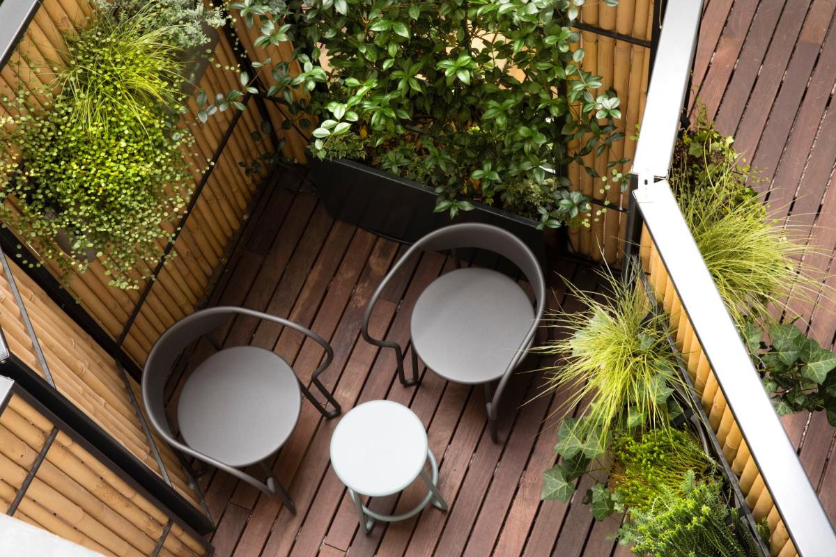 Jardin de l'établissement Hôtel R de Paris - Boutique Hotel