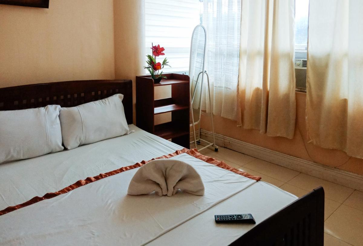 Suitetrails - Villa Asuncion Country Inn and Resort Iloilo by RedDoorz