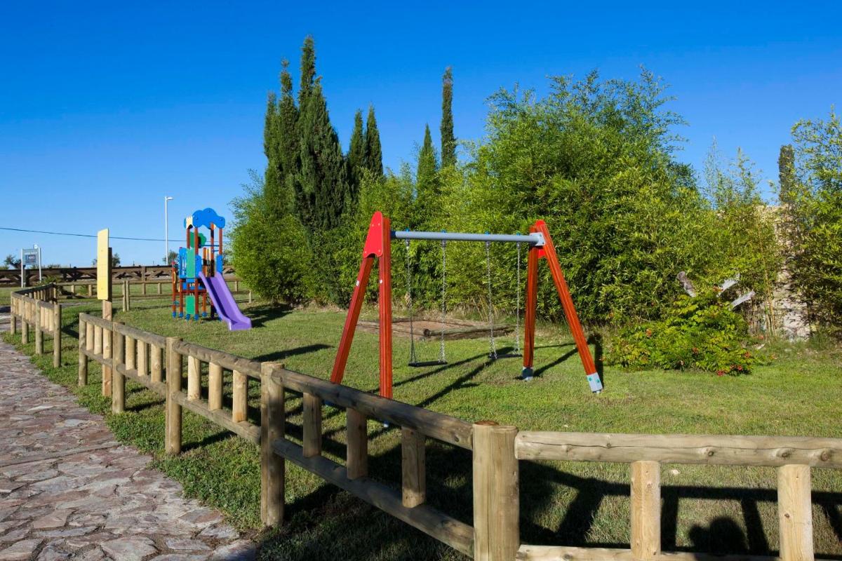 Zona de juegos infantil en Hospes Palacio de Arenales & Spa